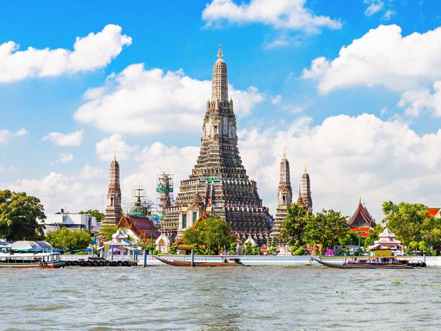 Bangkok, olifanten en strand in Thailand met het gezin