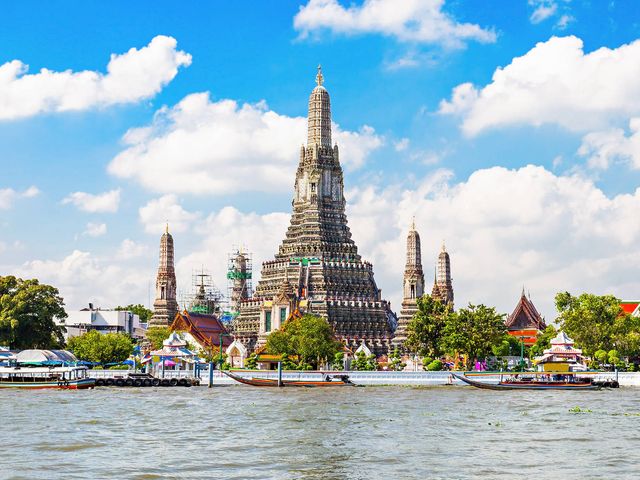 Bangkok, olifanten en strand in Thailand met het gezin